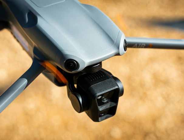 Close-up of a drone equipped with spraying technology.